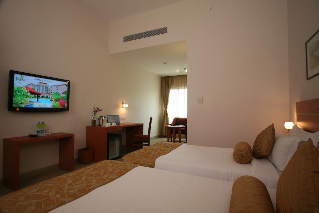 Hotel Leonia Holistic Destination à Shamirpet Chambre photo